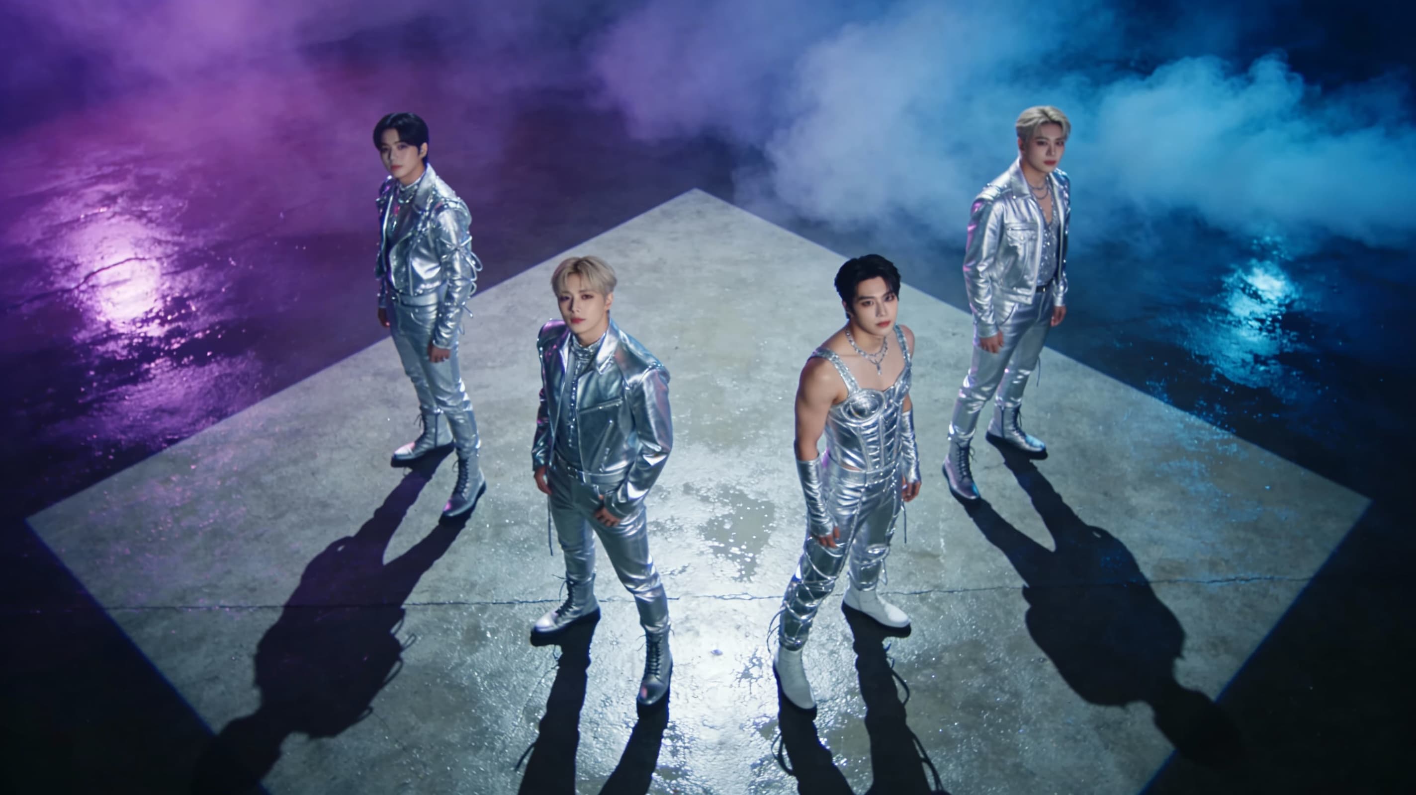 K-pop{argument name="member count" default="four members"} group concept photo, precise positioning in a diamond-shaped formation, unified futuristic silver style color scheme, dreamy purple-to-blue gradient lighting, wet ground reflecting the figures, and advanced retouching that keeps skin texture while unifying the tone. Make the members especially photogenic, striking, and full of stage presence. Use an SM Entertainment visual style, mixed soft and hard lighting, background smoke for depth, and an album-concept composition.